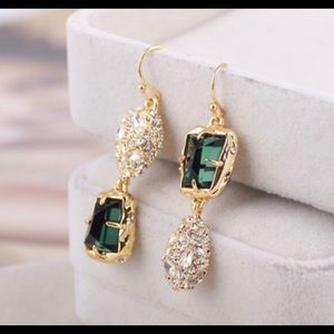 Alexis Bittar Unmatched double tone earrings.